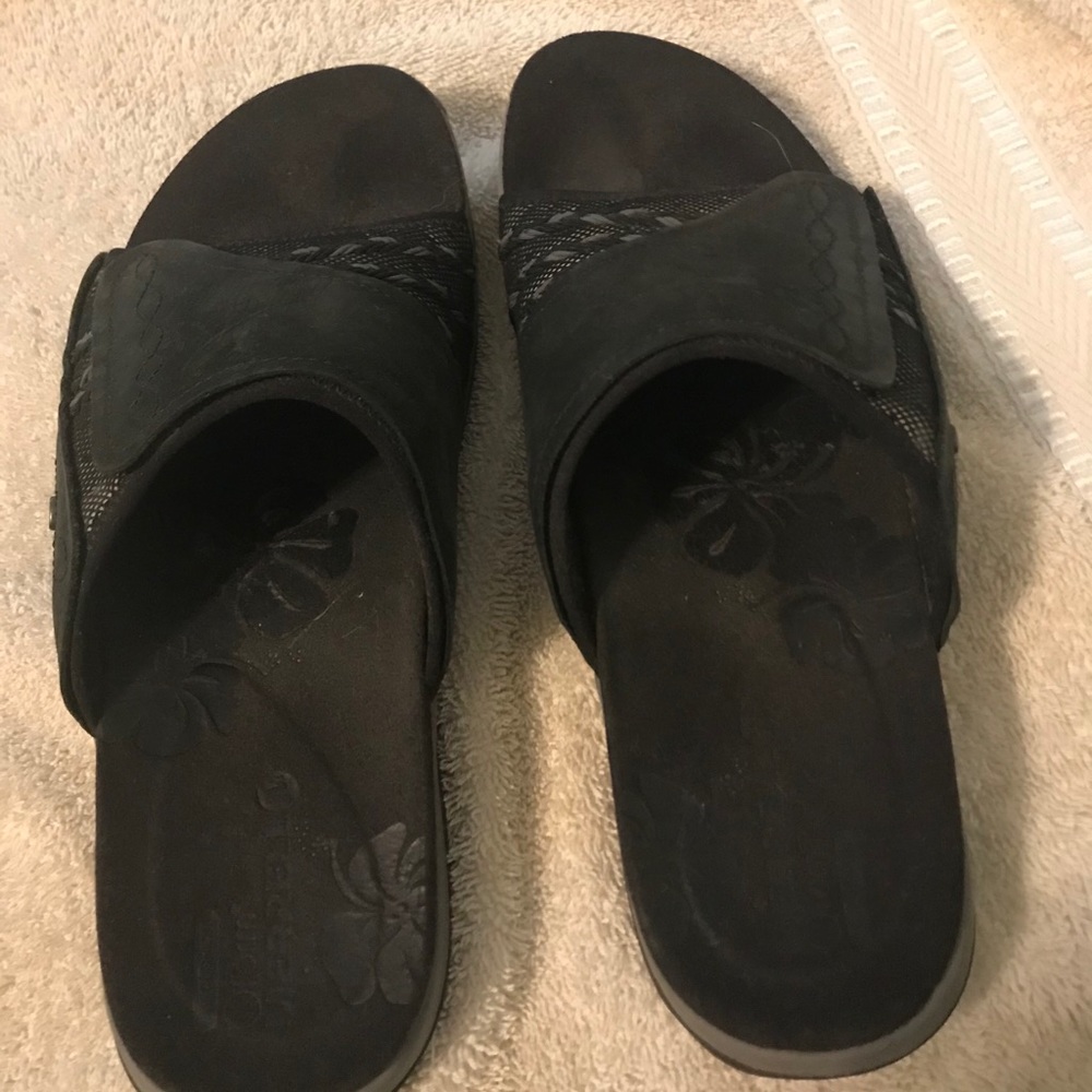 Merrell sandals. My foot was too wide for them.